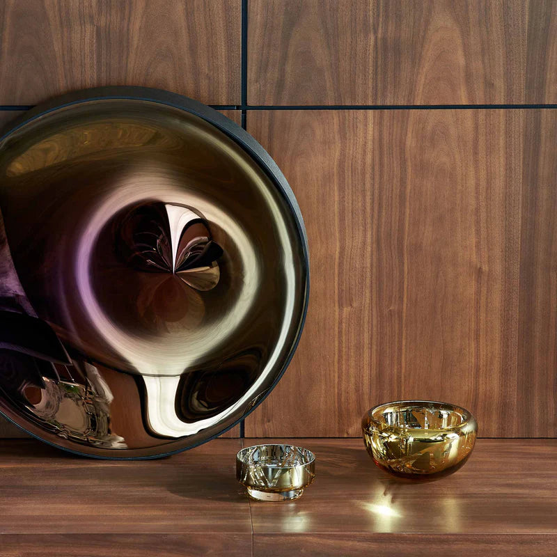 Apvalus gintaro spalvos dubuo su raštais