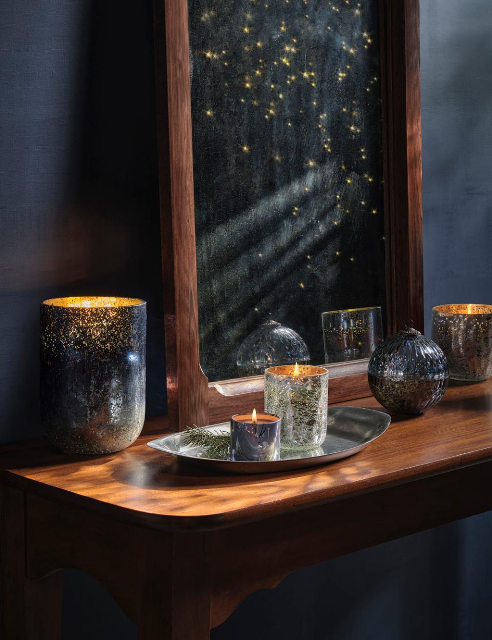 Spragsinti stiklinė žvakė "North Sky"